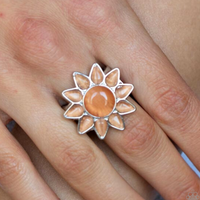 "Blossoming Sunbeams" Silver Metal & Orange Cat's Eye Sun/Flower Elastic Back Ring